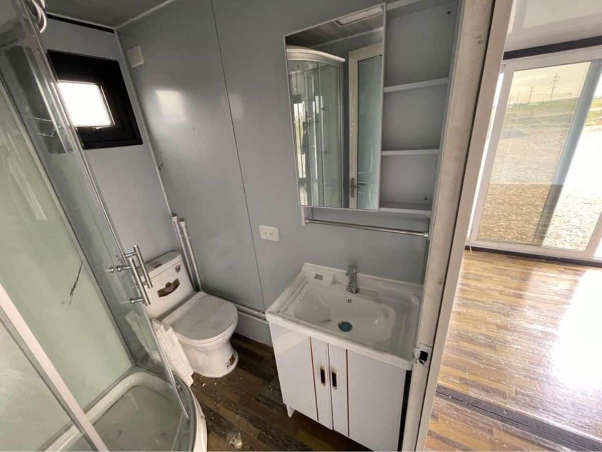 bathroom has all the standard fittings ie sink with vanity & mirror, toilet etc