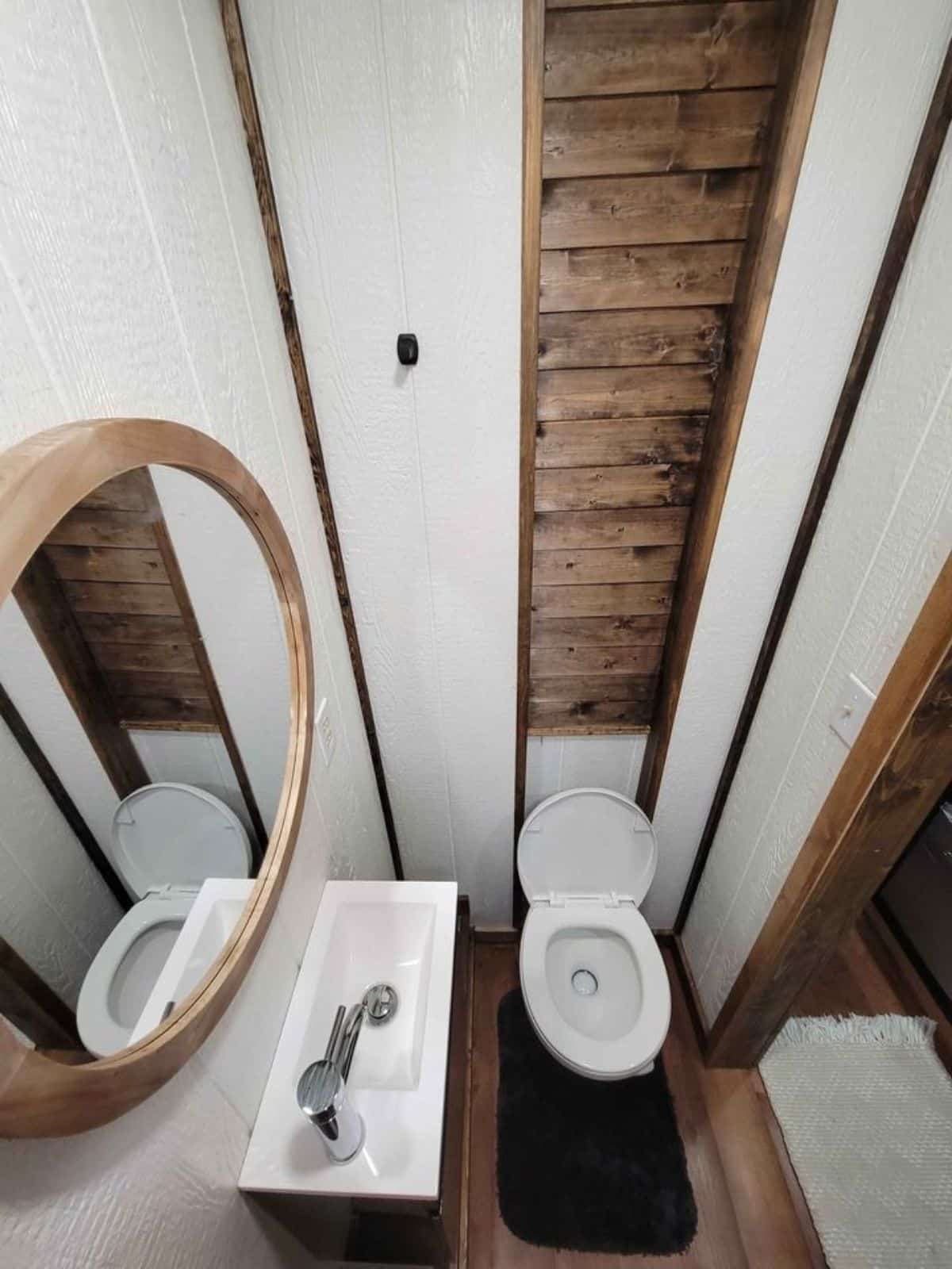 standard fitting in bathroom of 25' tiny house on wheels