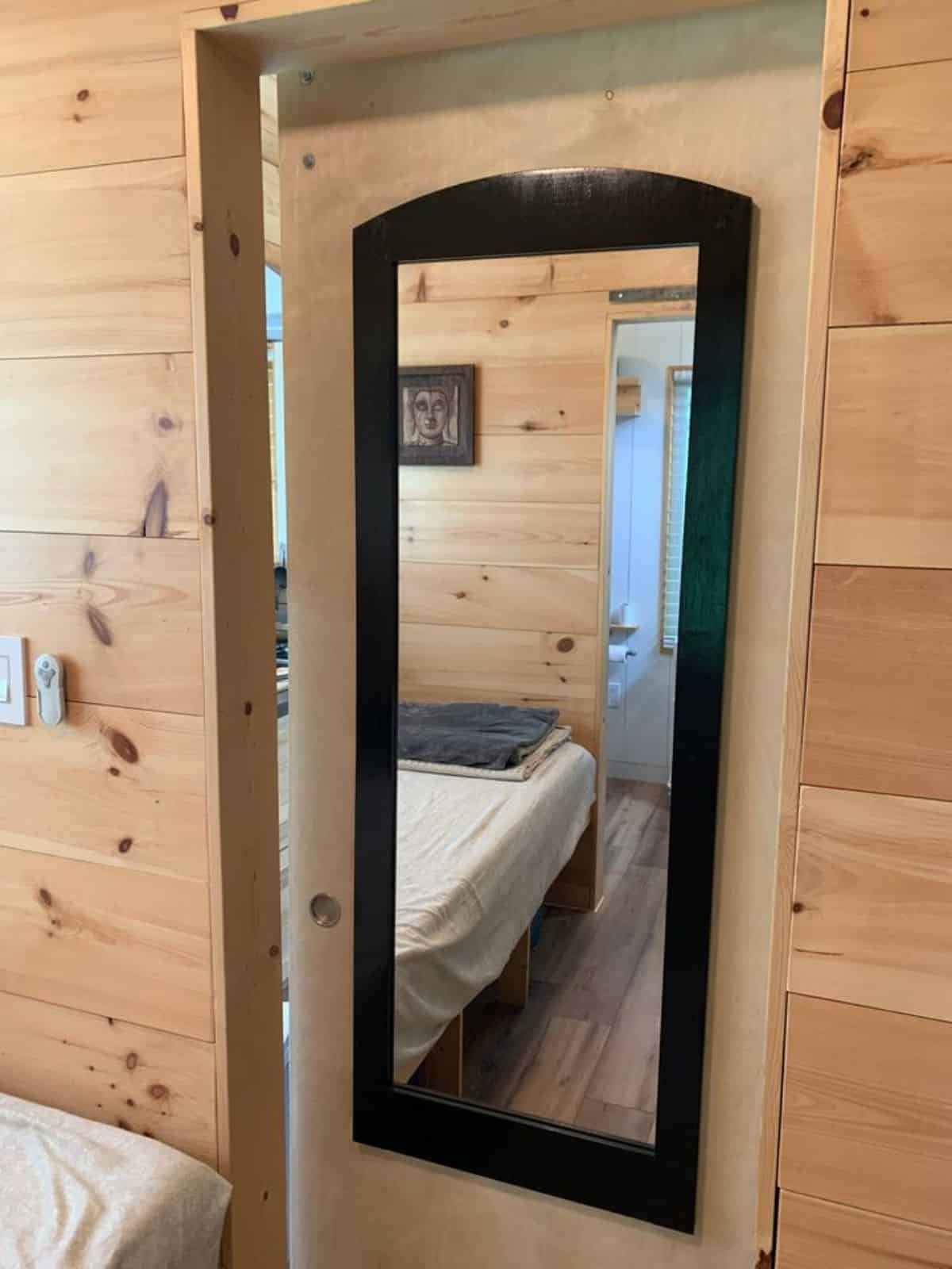mirror on sliding door of the bedroom
