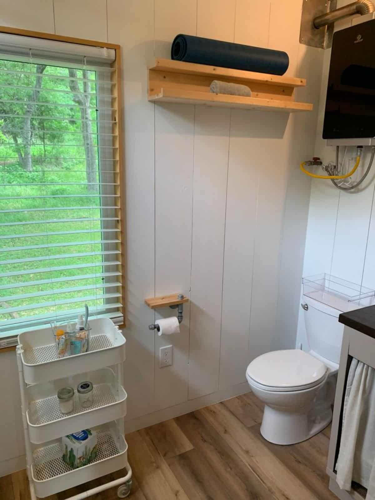 standard fittings in bathroom of 28’ custom tiny home