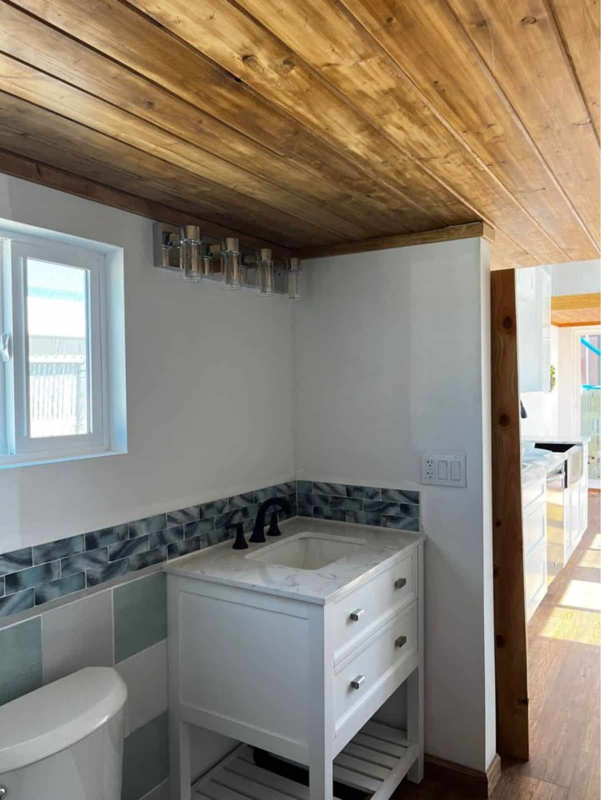 sink with vanity in bathroom of luxury home on wheels