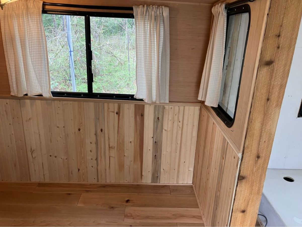 huge windows of revamped tiny home