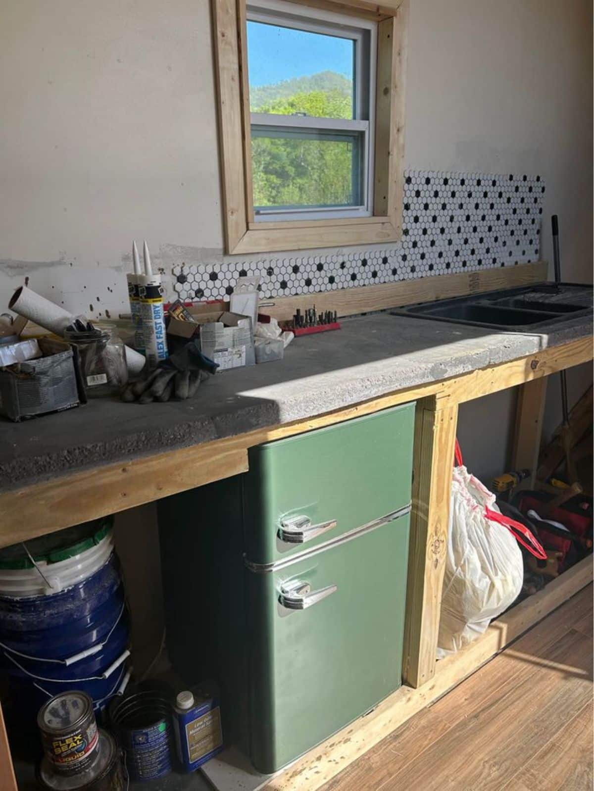 kitchen area of drivable tiny home