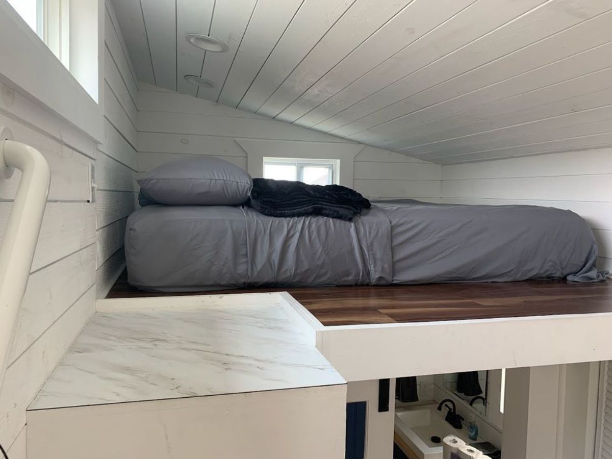 loft has a comfortable mattress and is accessible through the stairs