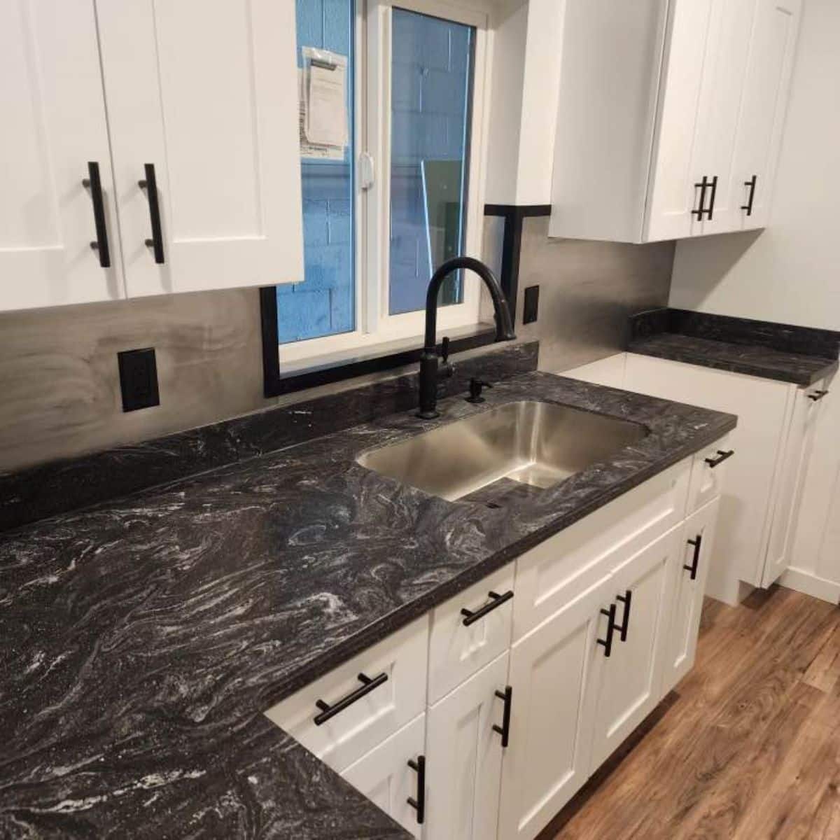 L shaped kitchen countertop of beautiful container home