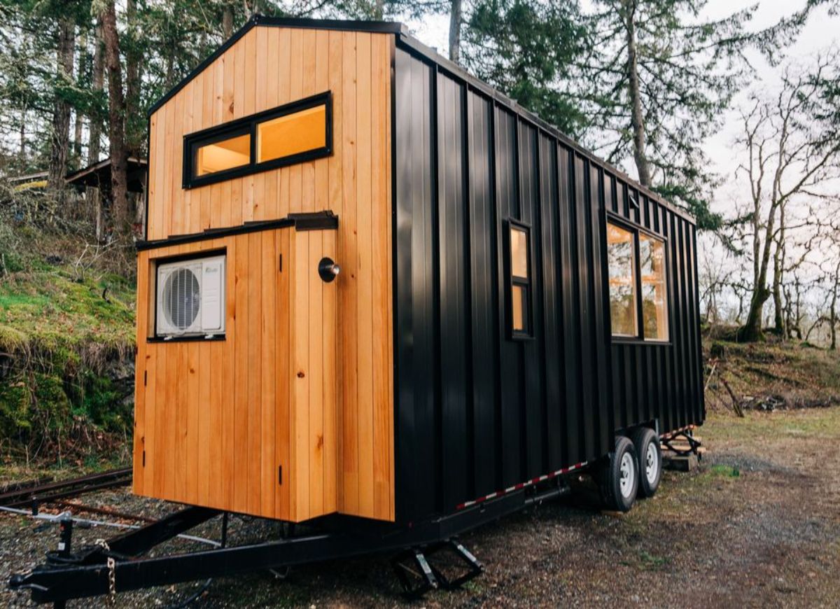 stunning black and brown exterior from backside of beautifully crafted tiny home