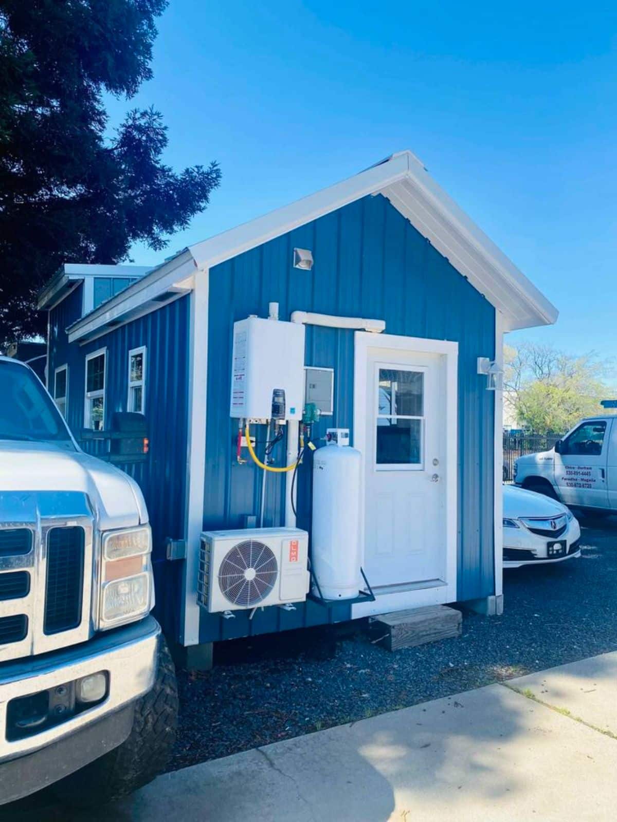 blue exterior of brand new tiny house