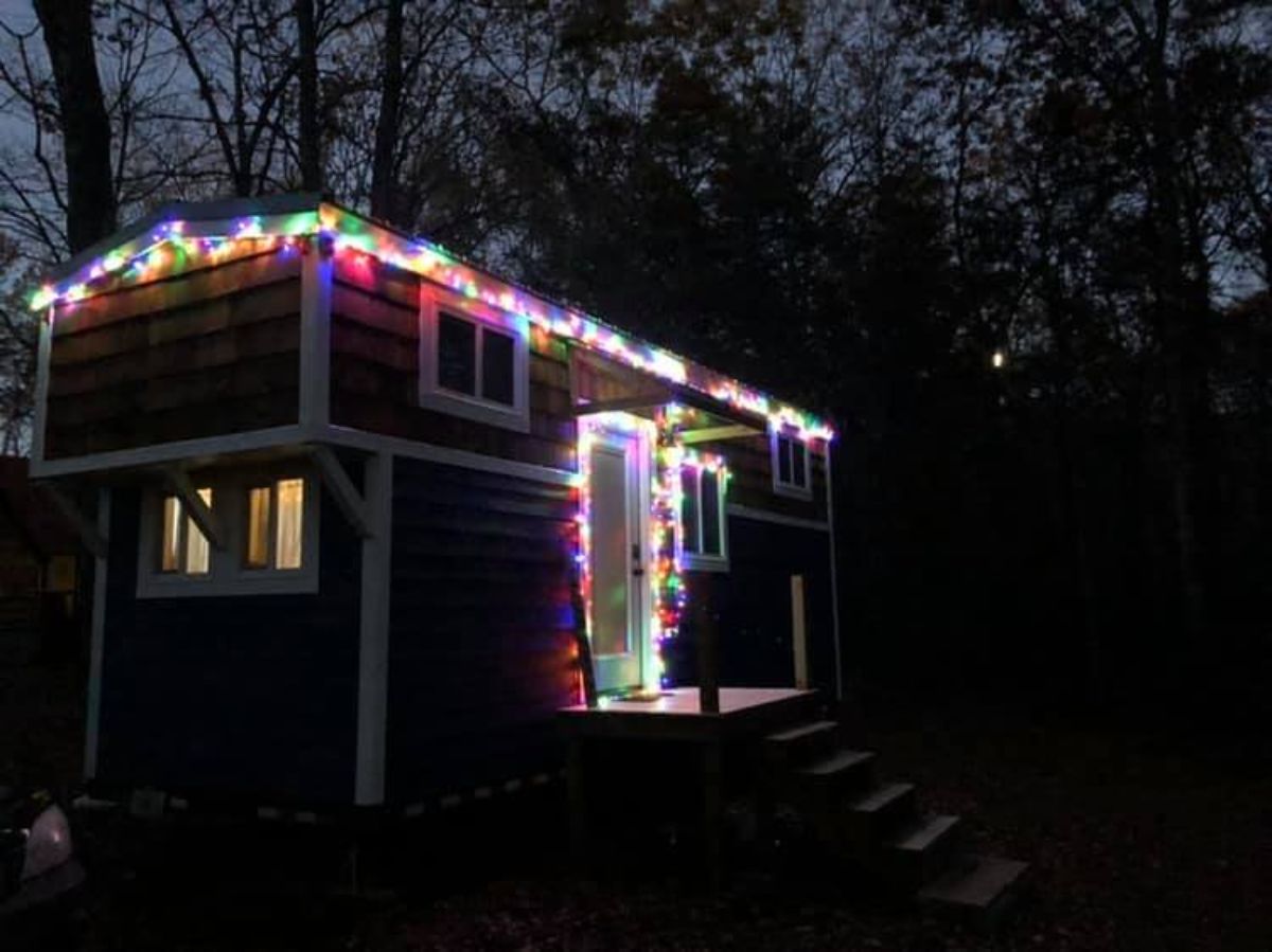 Noah certified tiny house at night with lights