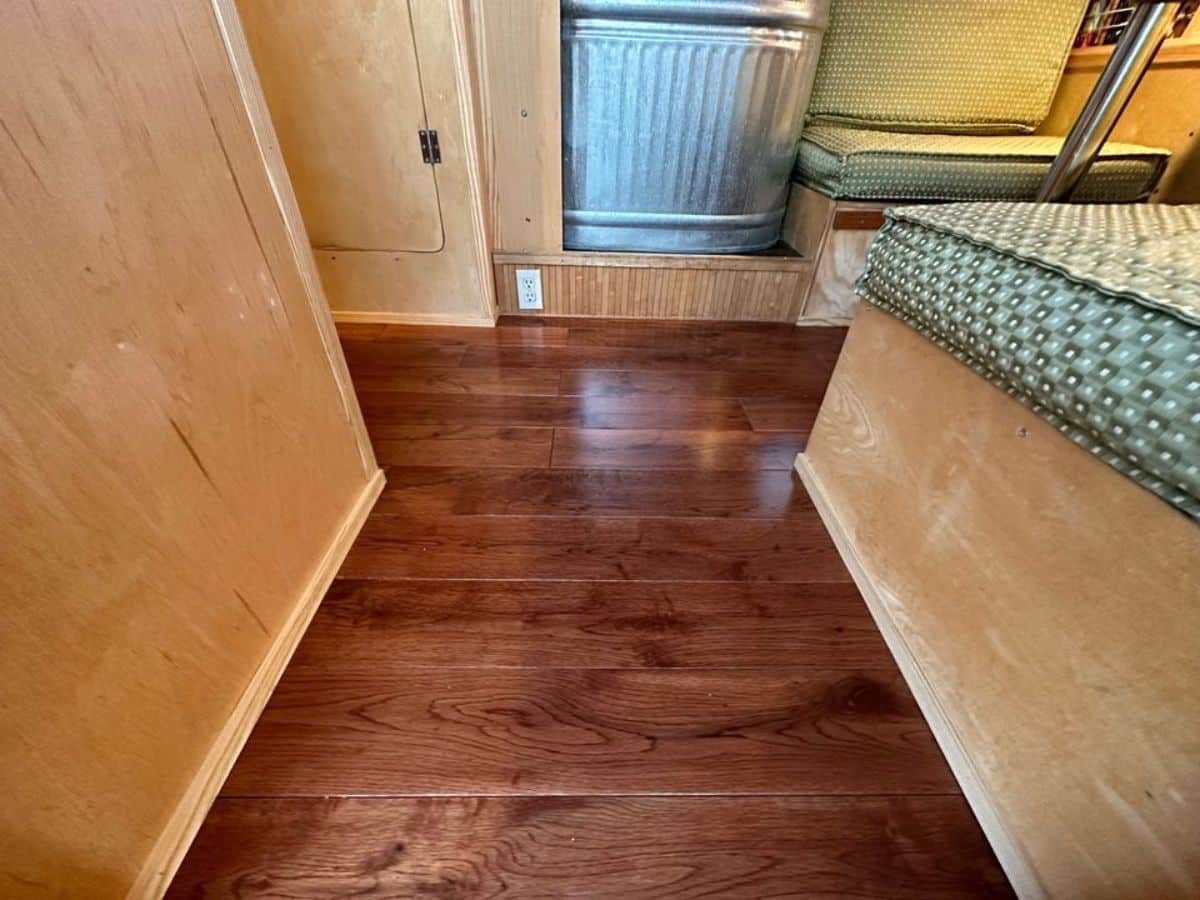 wooden flooring all over the house of rare custom built tiny home