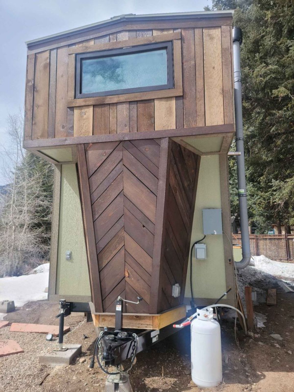 backside of 1 bedroom tiny house from outside