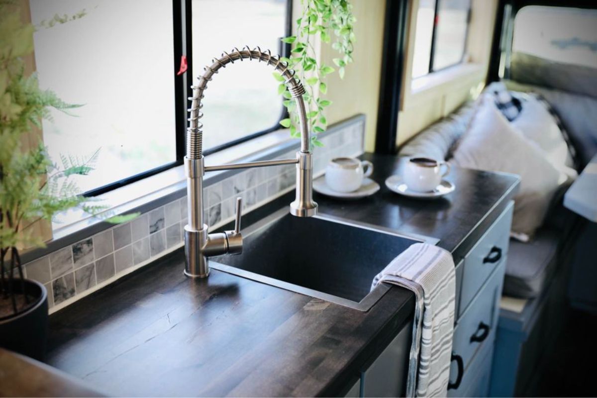 stainless steel sink in kitchen area of turnkey ready offgrid home