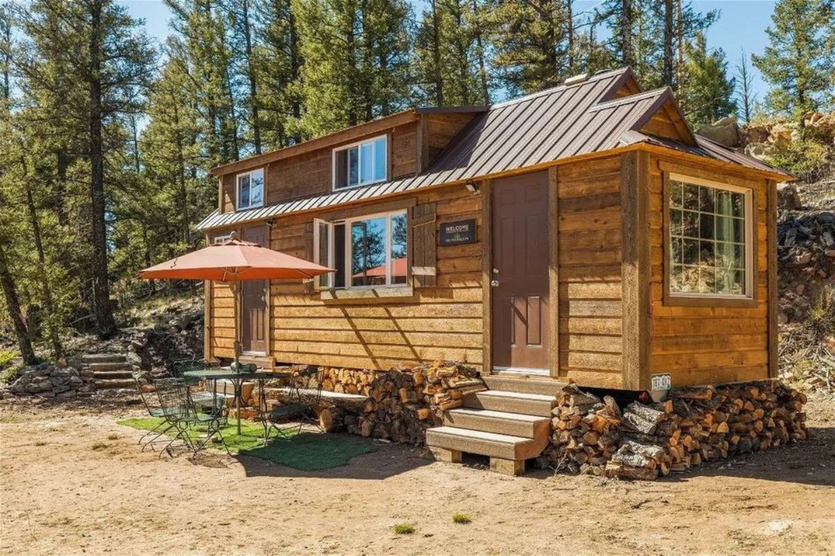 stunning wooden exterior of 28' rustic tiny home
