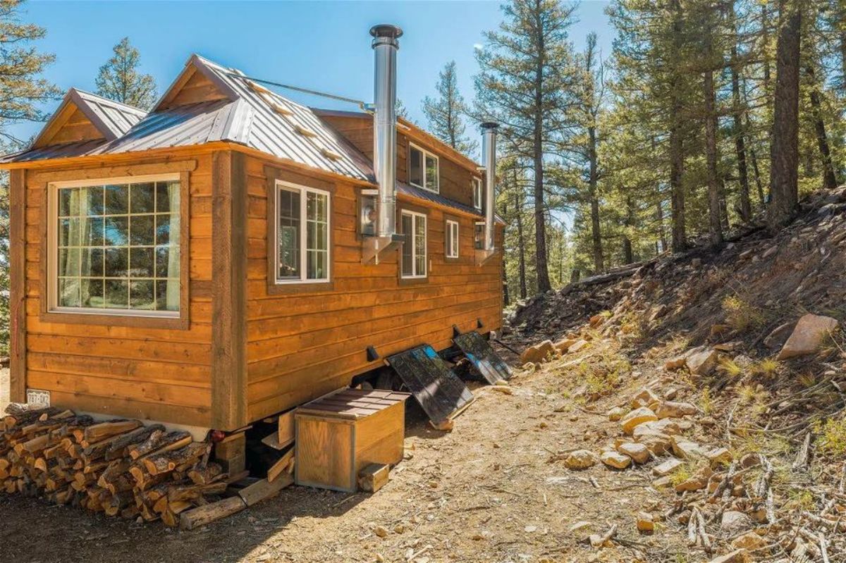 backside of 28' rustic tiny home