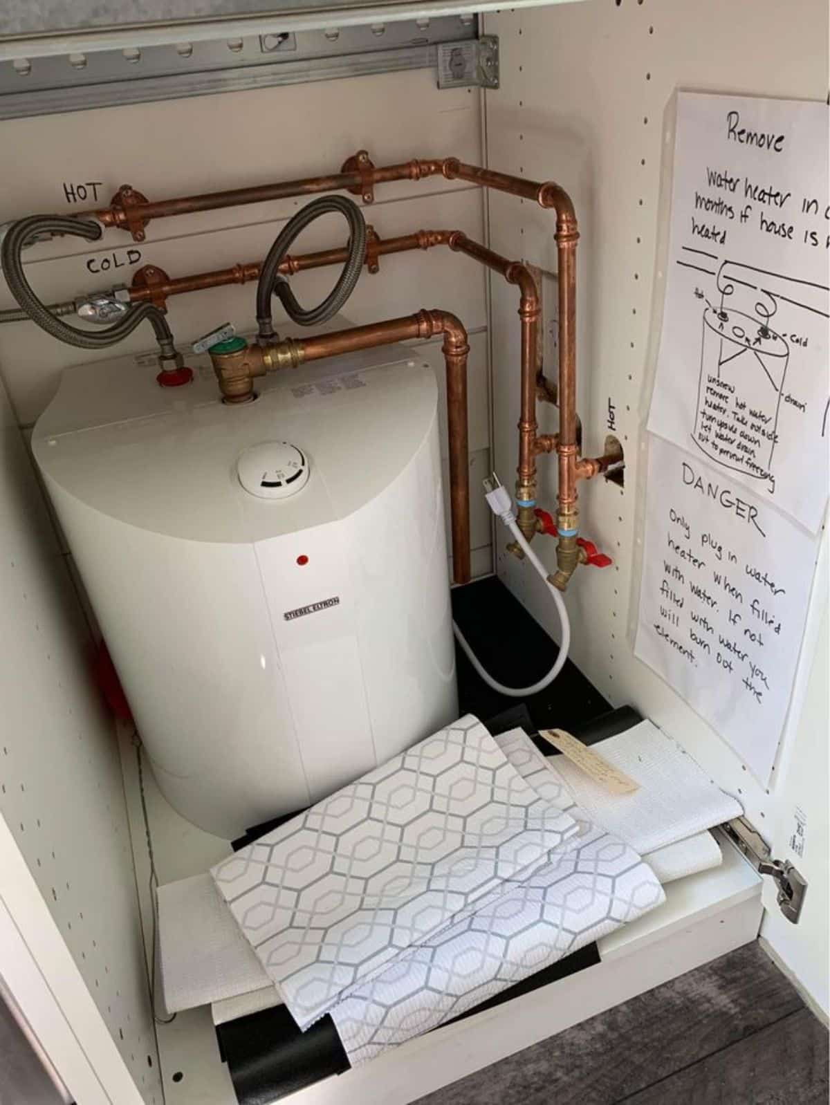 water plumbing and electrical fittings of minimalist tiny home