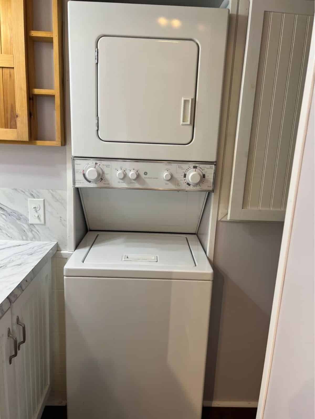 washer dryer combo included in the bathroom