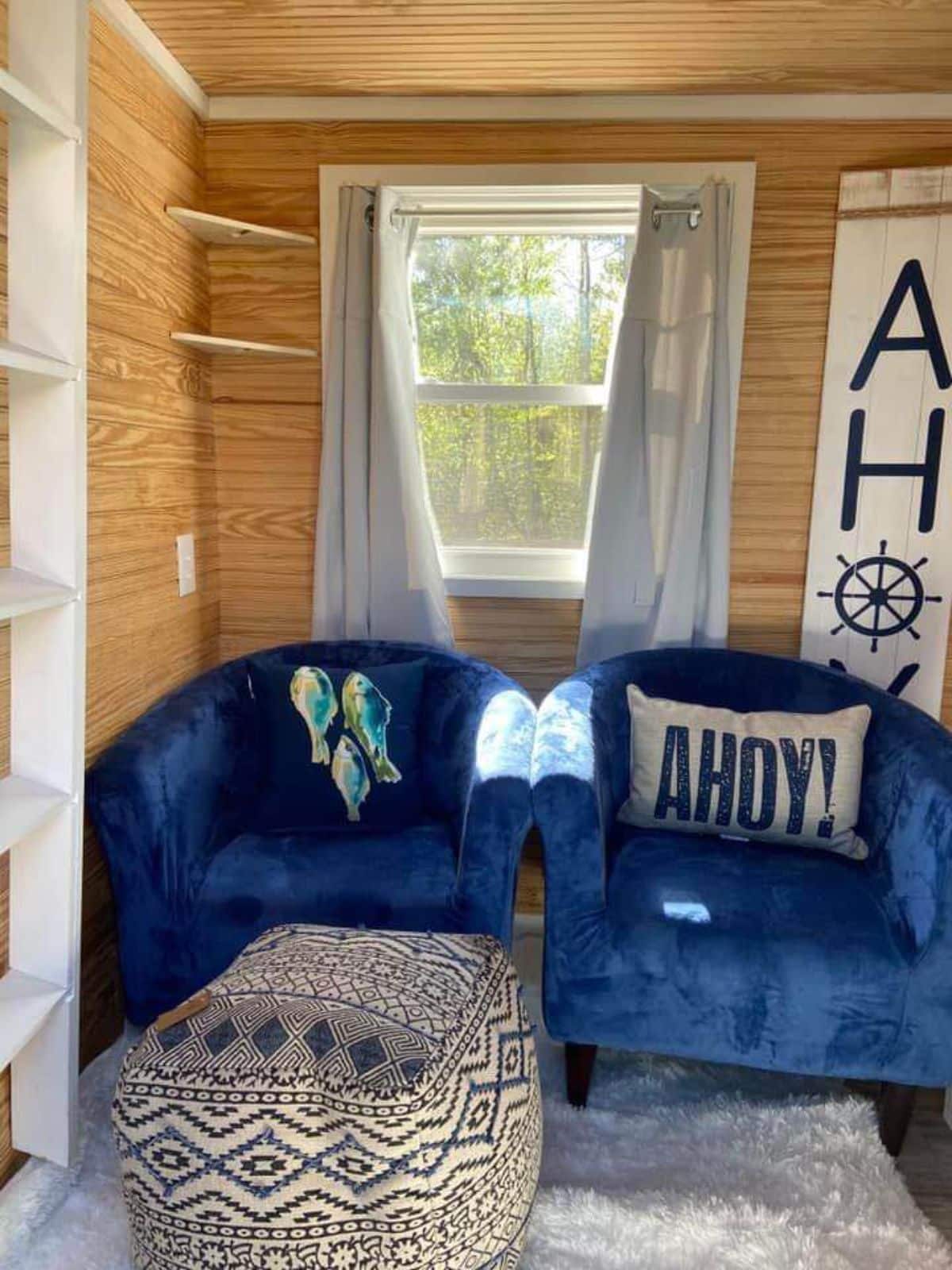 living area of cozy tiny home has a couch