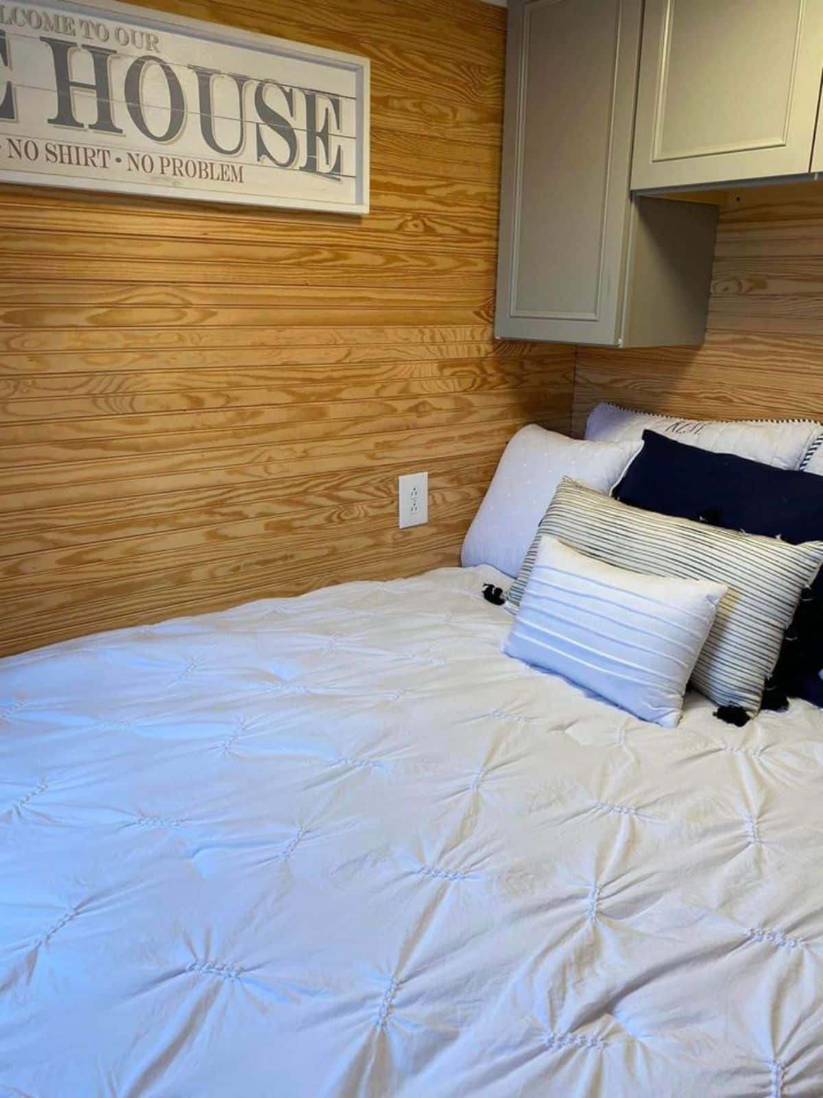 very comfortable mattress in the living area of cozy tiny home