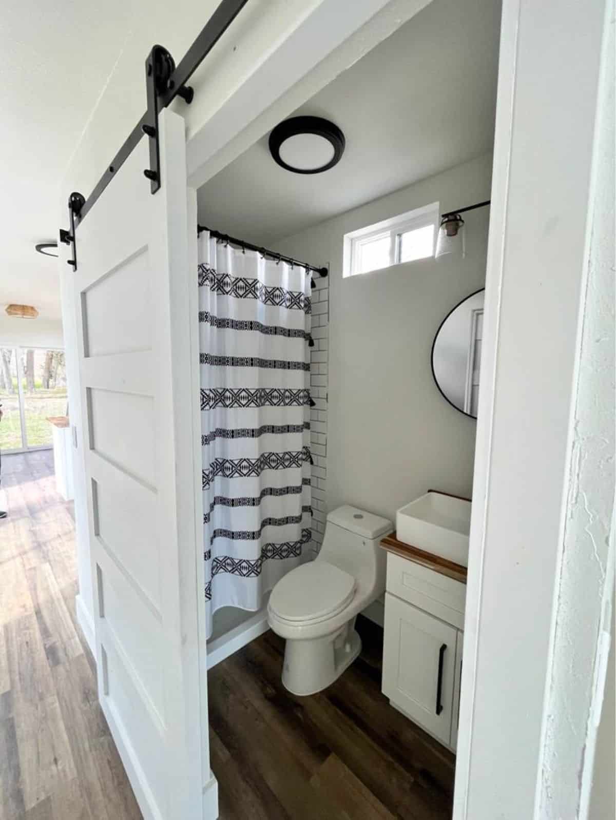 bathroom of shipping container home has all the standard fittings