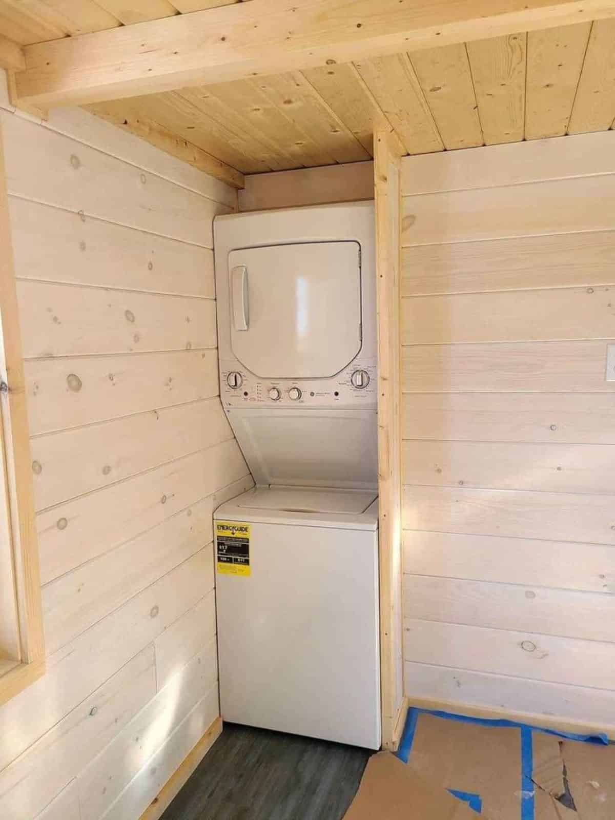washer dryer combo is also included in bathroom