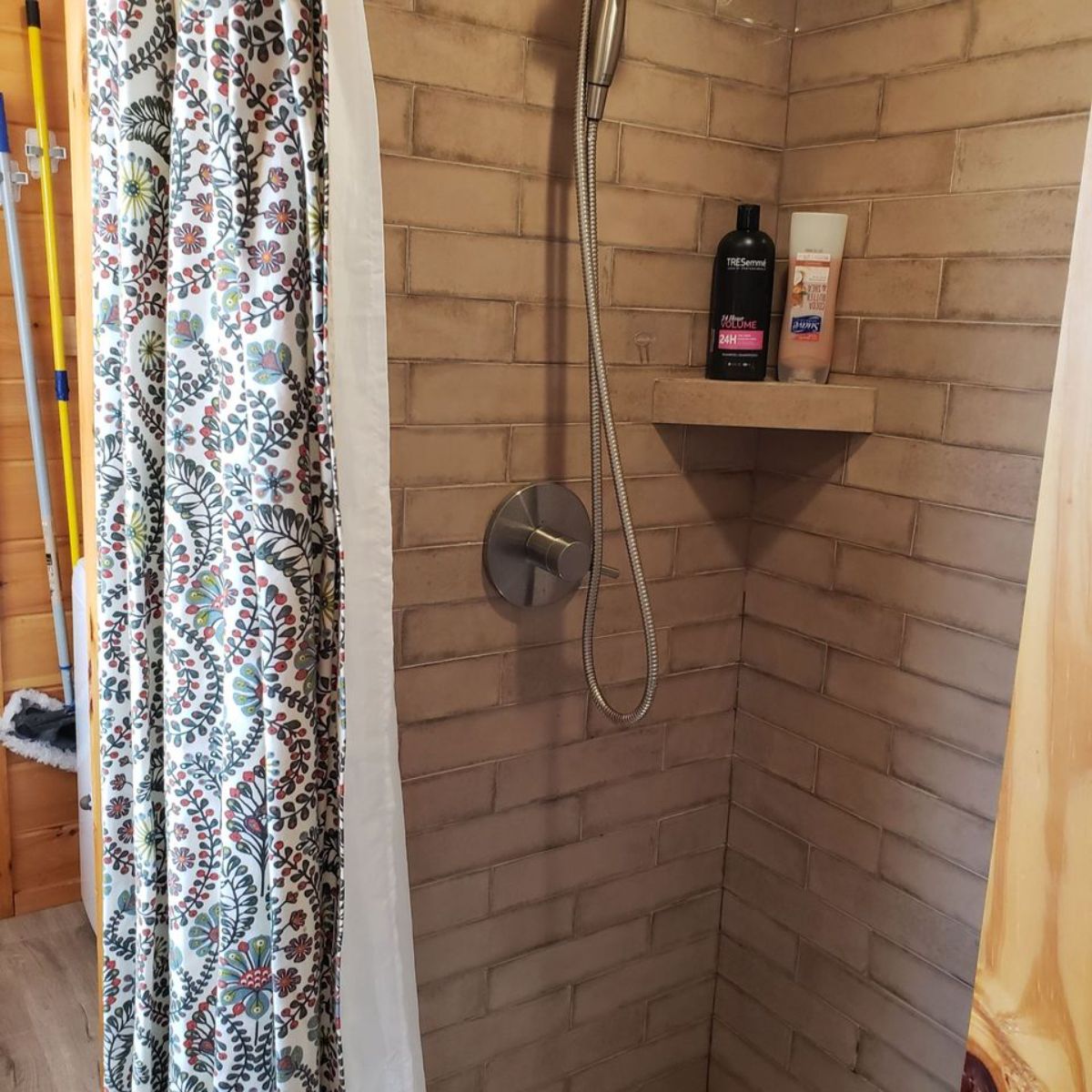 bathroom of container tiny home has all the standard fittings