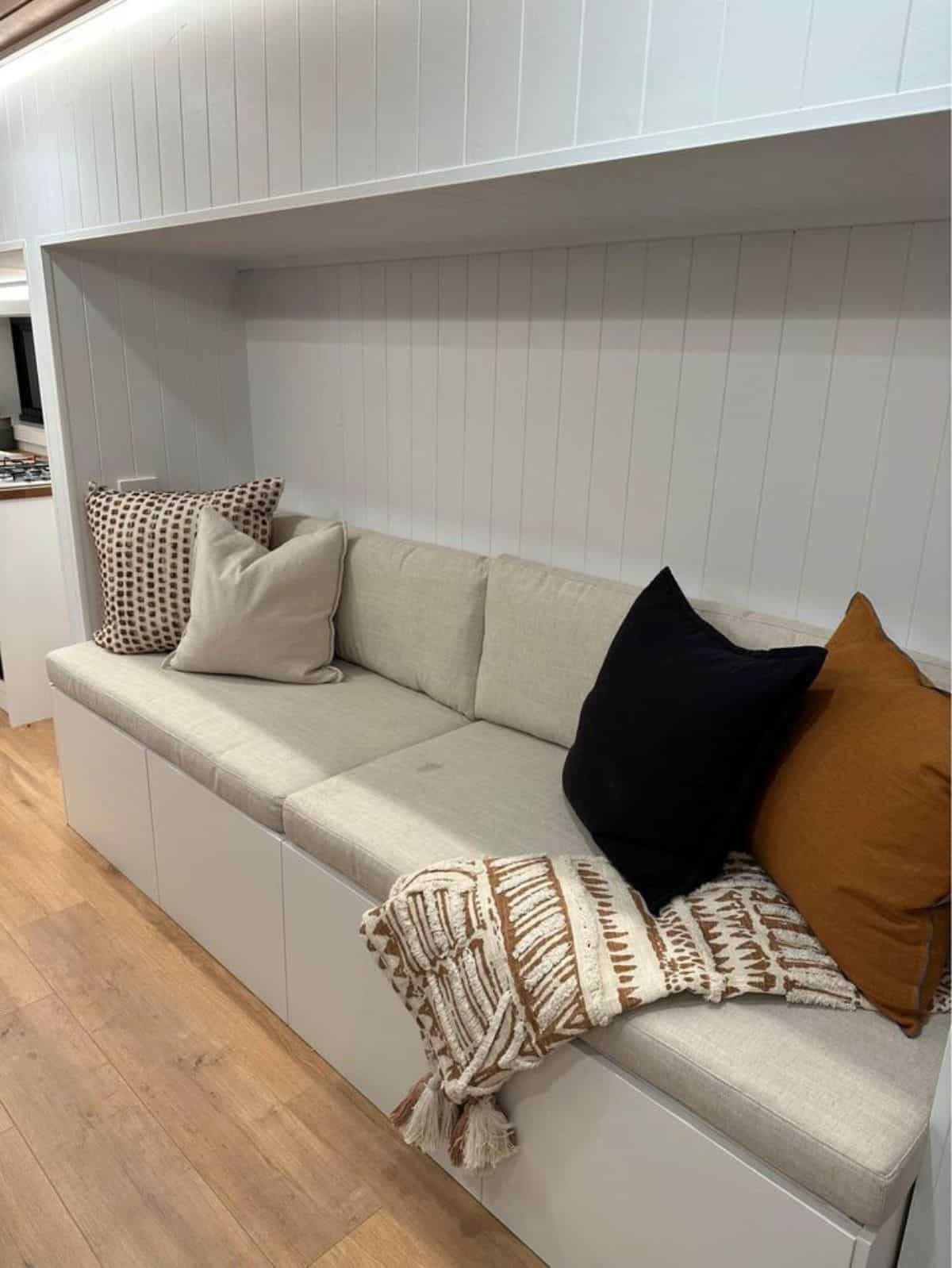 4 seater couch in living area of Australian tiny home