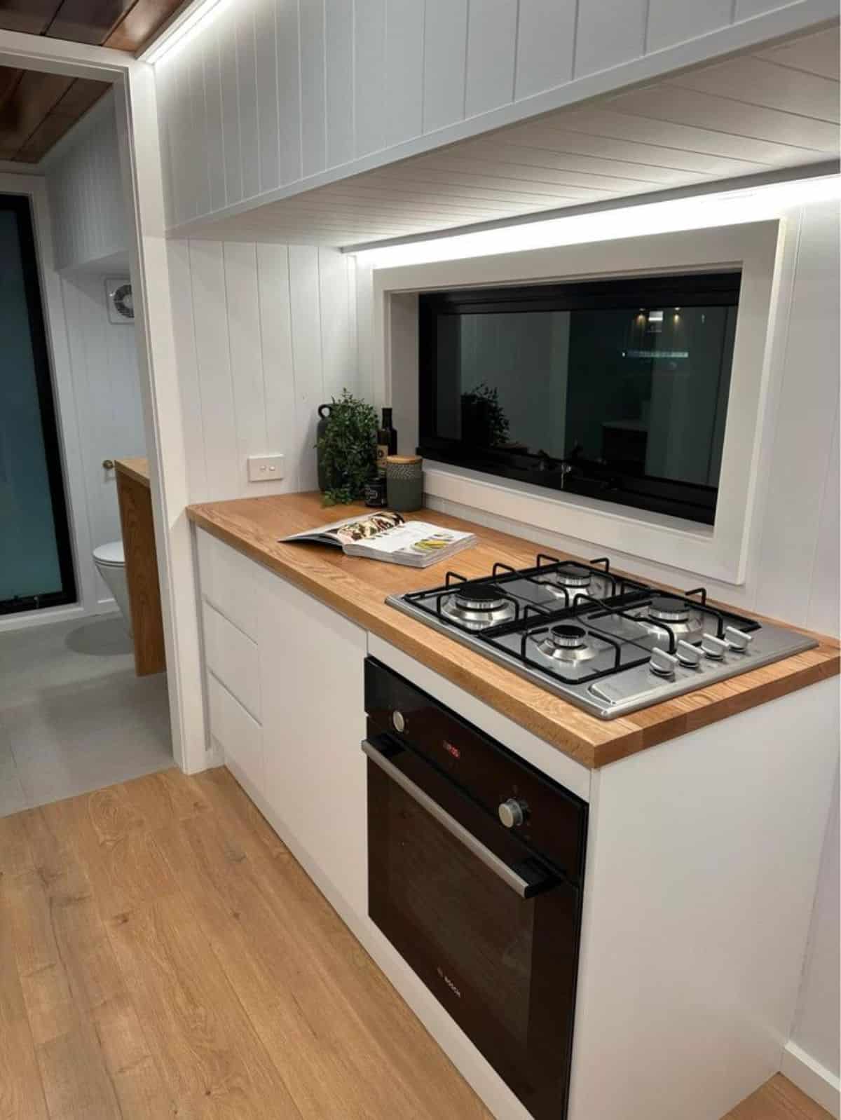 double galley kitchen setup with stove and oven