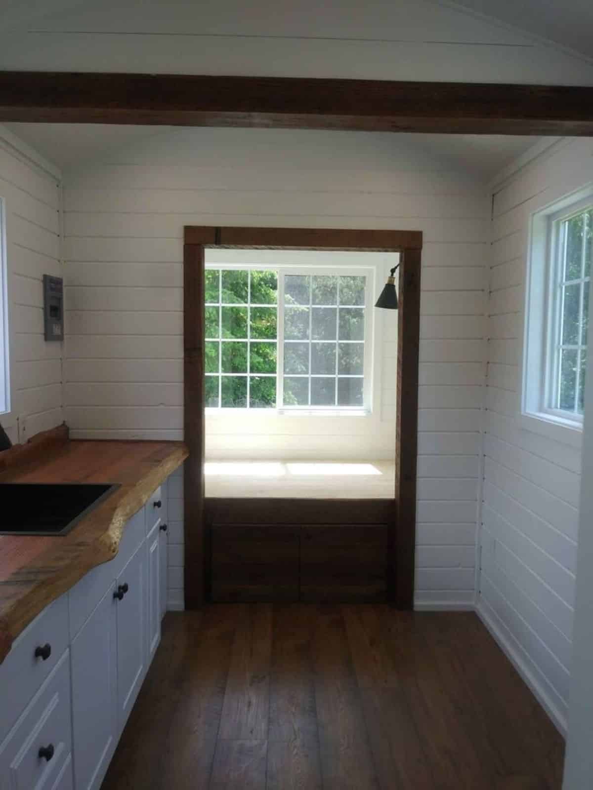 wooden interiors of 20’ cottage tiny house