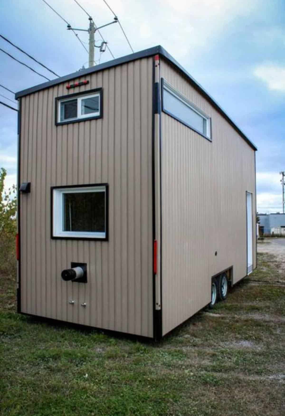 side view of beautiful tiny house from outside