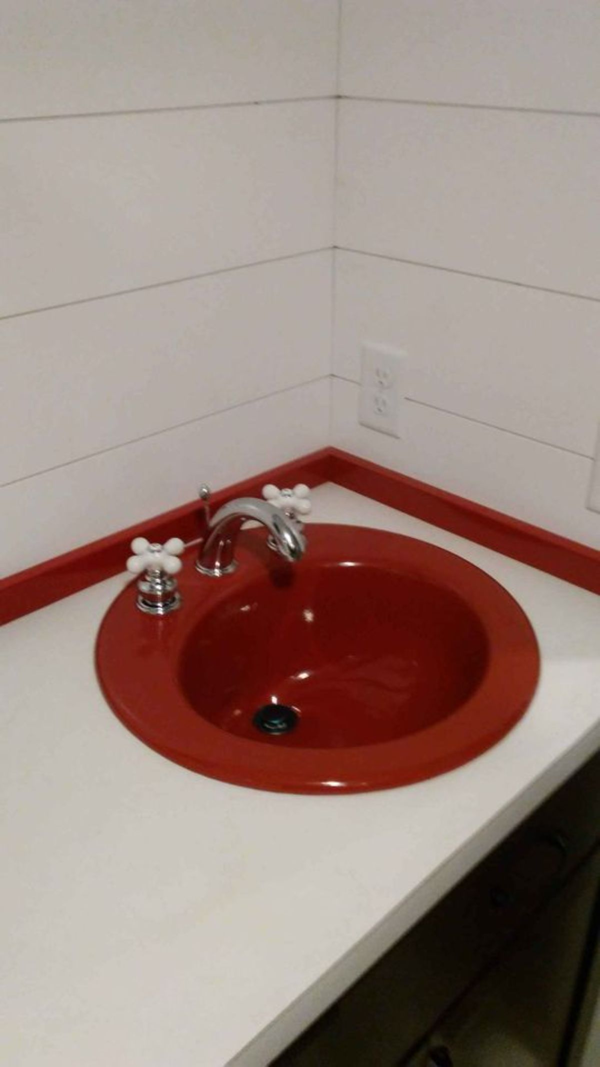 cute sink with washer dryer combo installed in bathroom