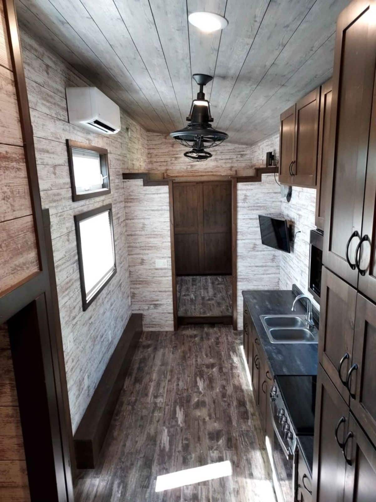 small loft above the bedroom area of tiny home in Minnesota