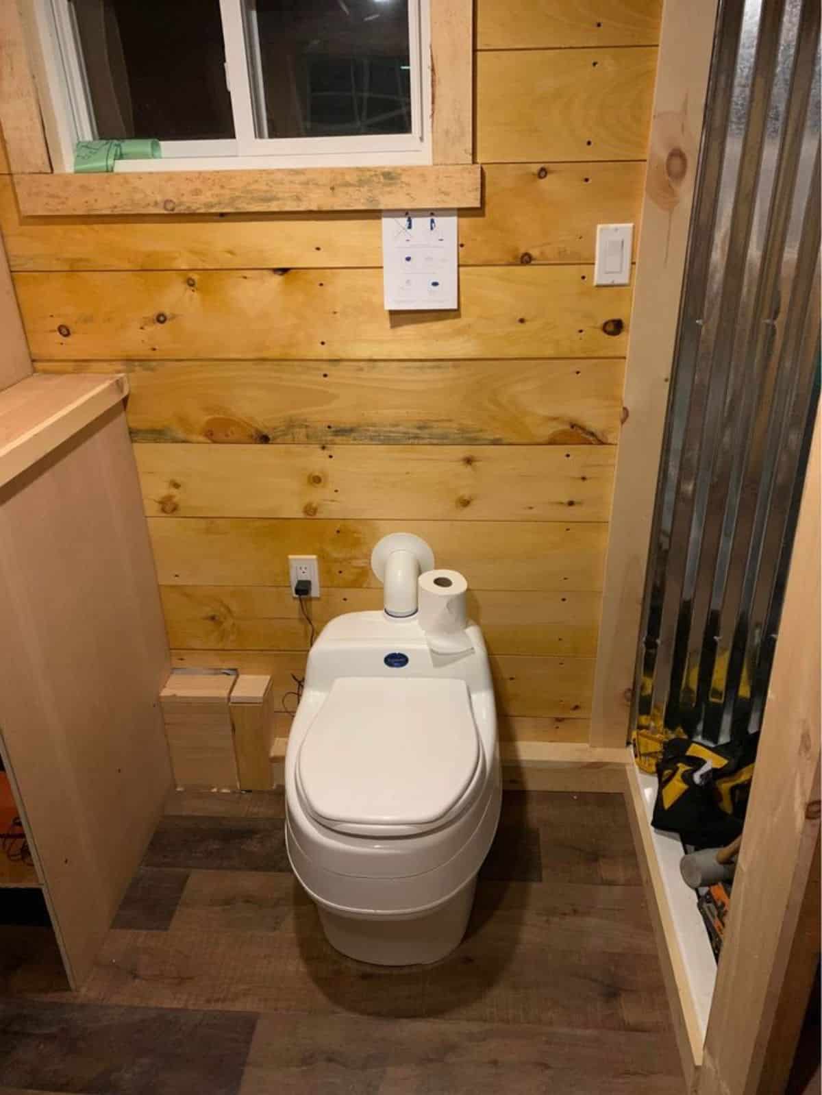 standard fittings in the bathroom of handcrafted tiny home