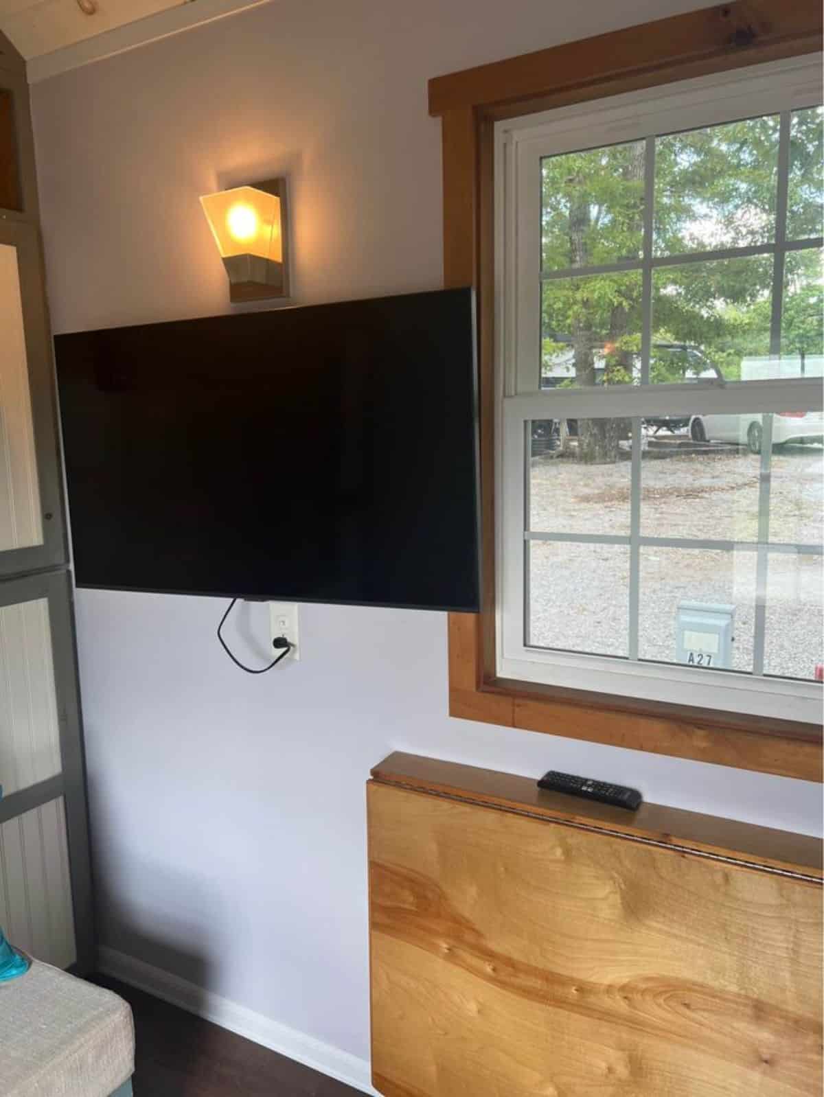 wall mounted TV set installed in living area