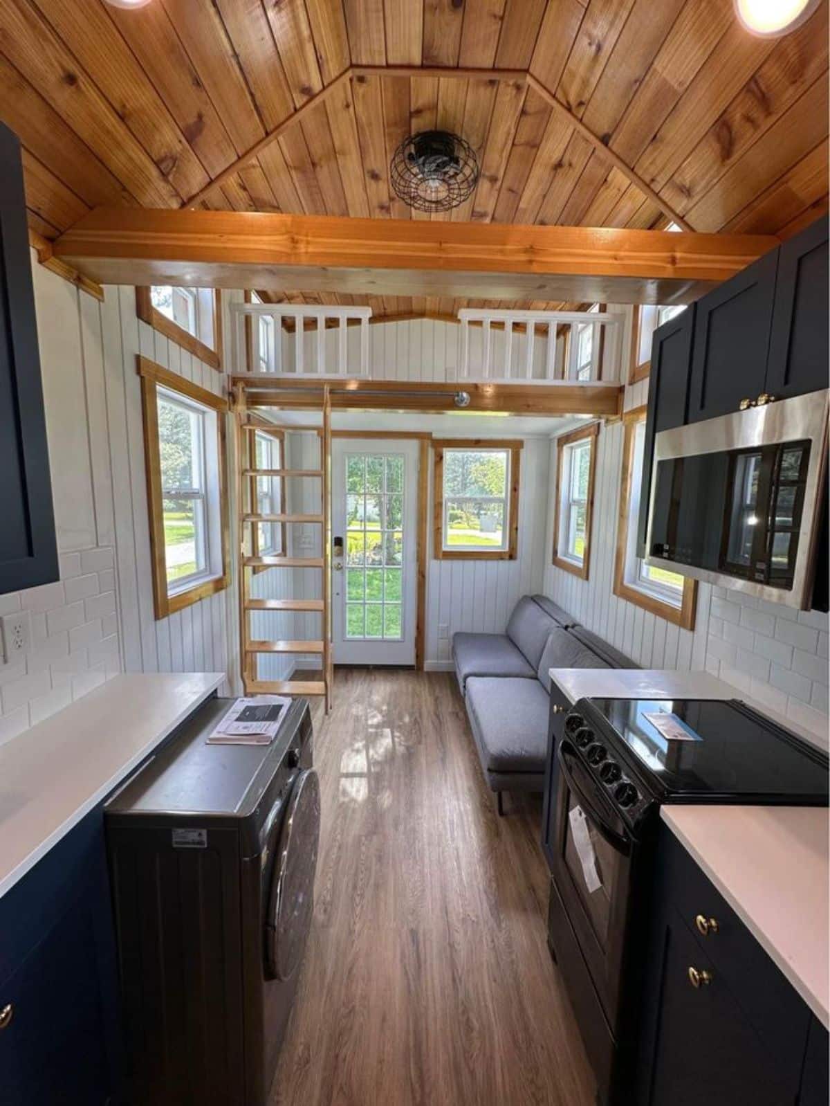full length interiors and living area of stunning tiny home