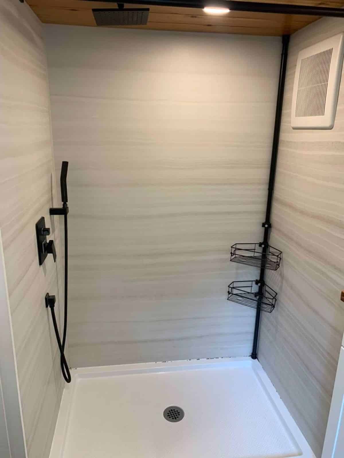 full length shower area in bathroom