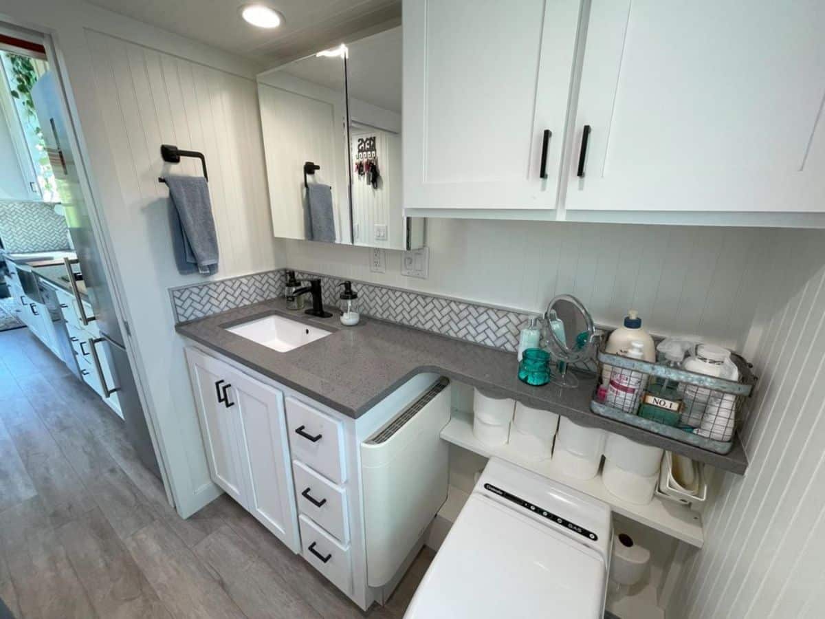 bathroom of 30’ two bedroom tiny home is very stylish with all the standard fittings