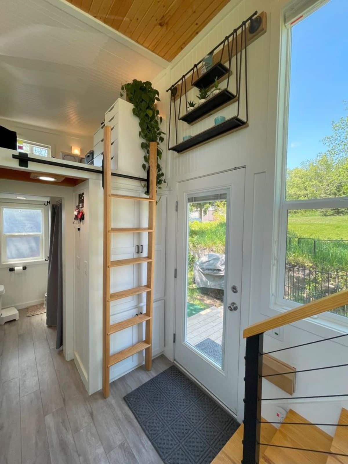 ladder leading to the another loft is besides the main entrance door