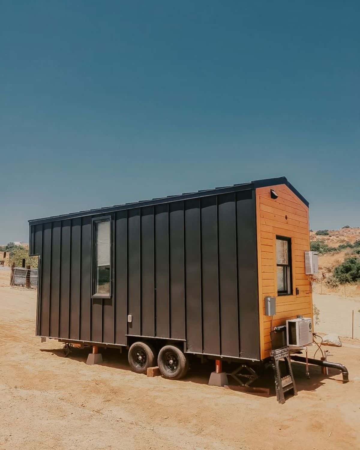 backside view of 20’ tiny house on wheels