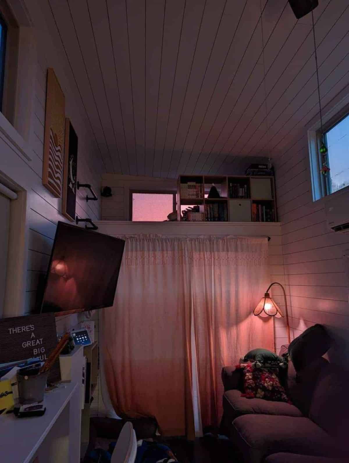interiors of custom built tiny home at night