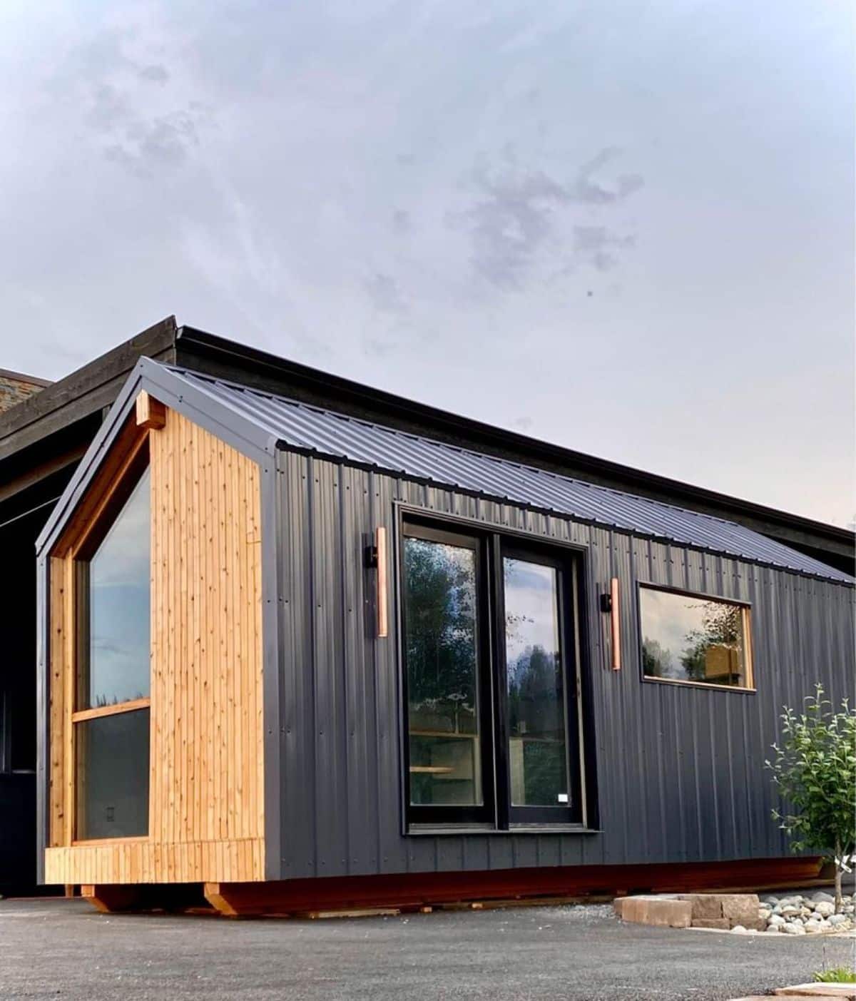 diagonal view of stunning tiny home from outside