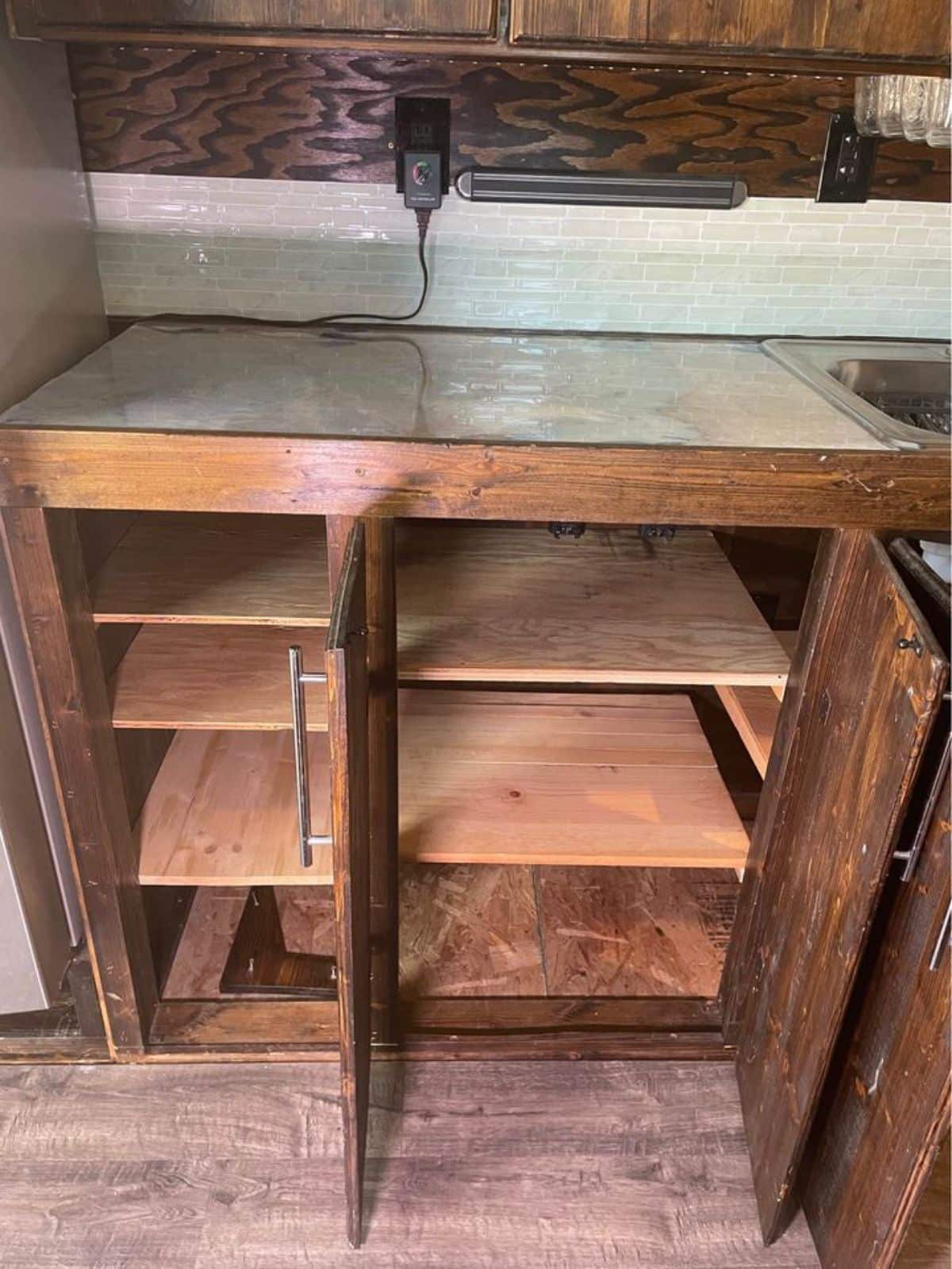 wooden storage cabinets in the kitchen