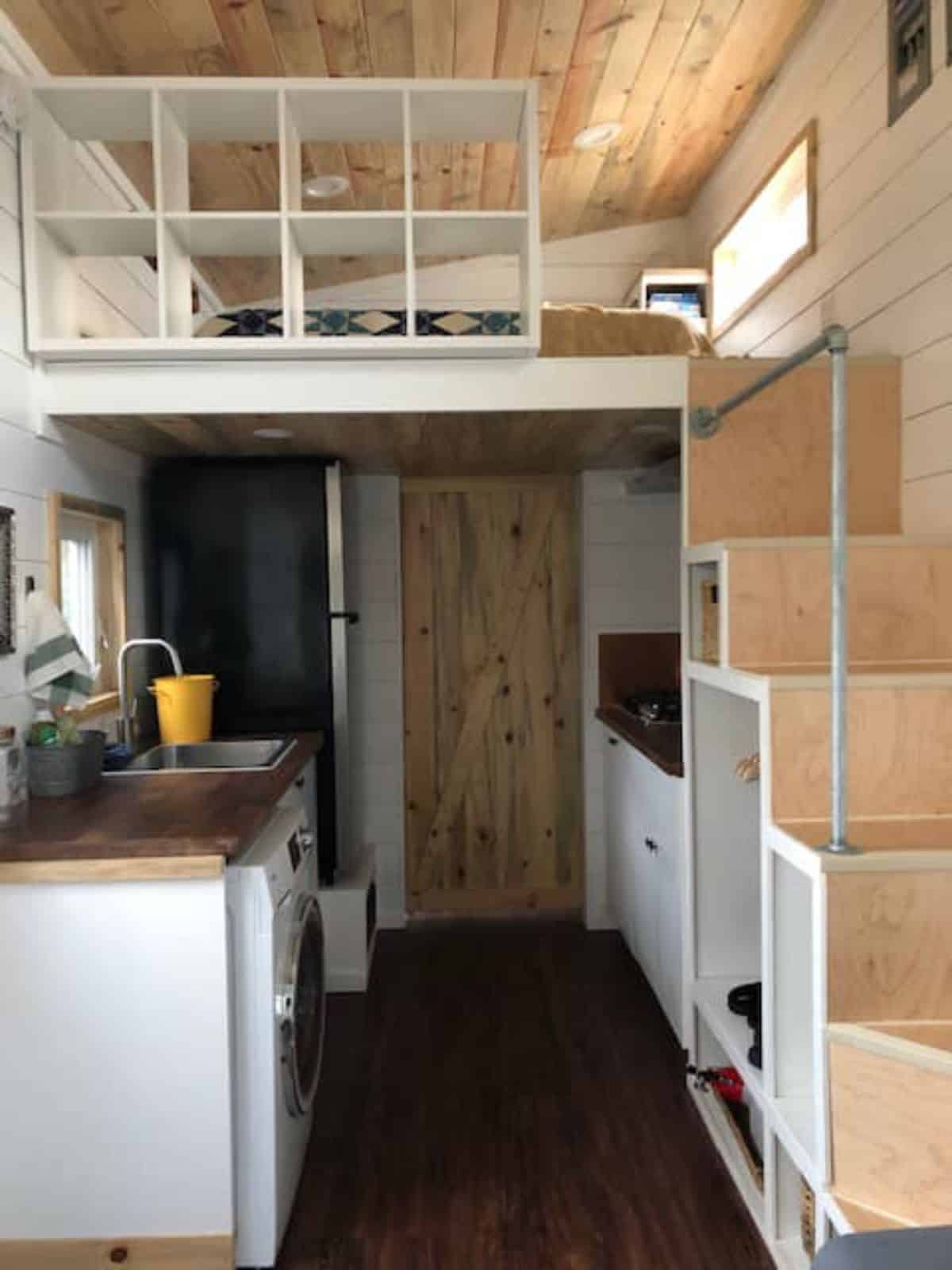 full length wooden interiors of 20' fully furnished tiny home