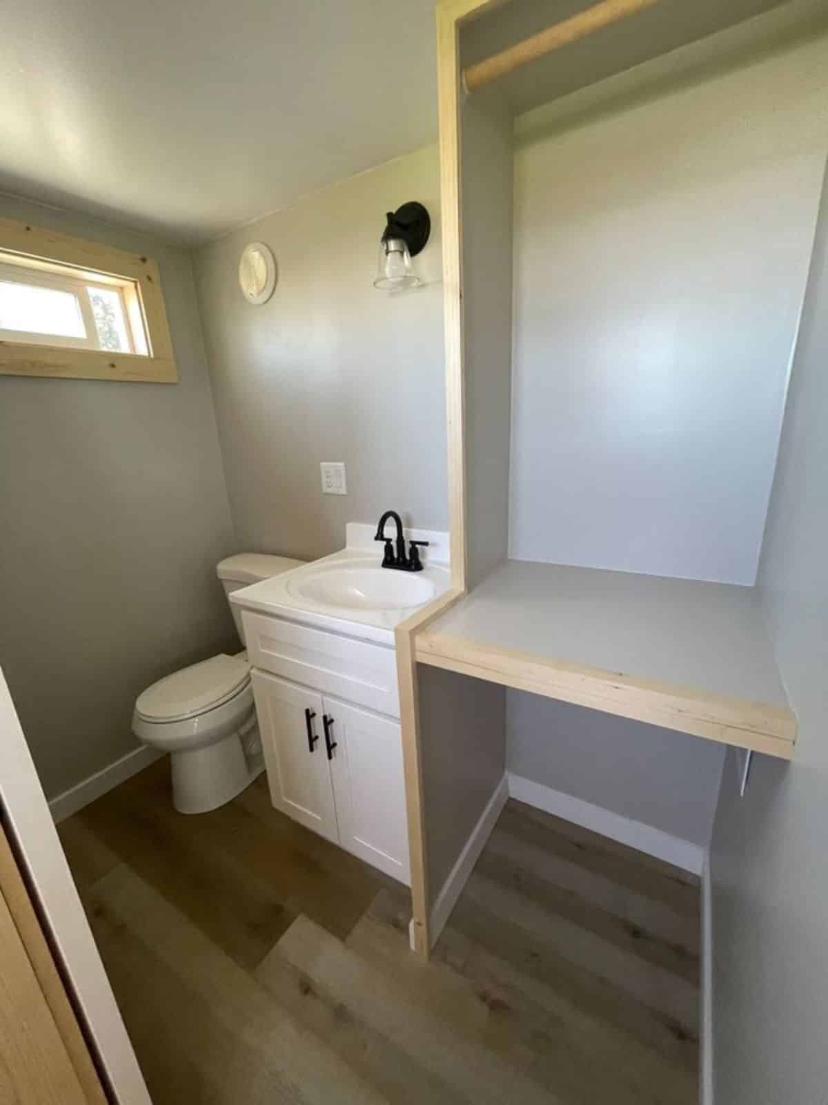 bathroom of tiny home for two has all the standard fittings