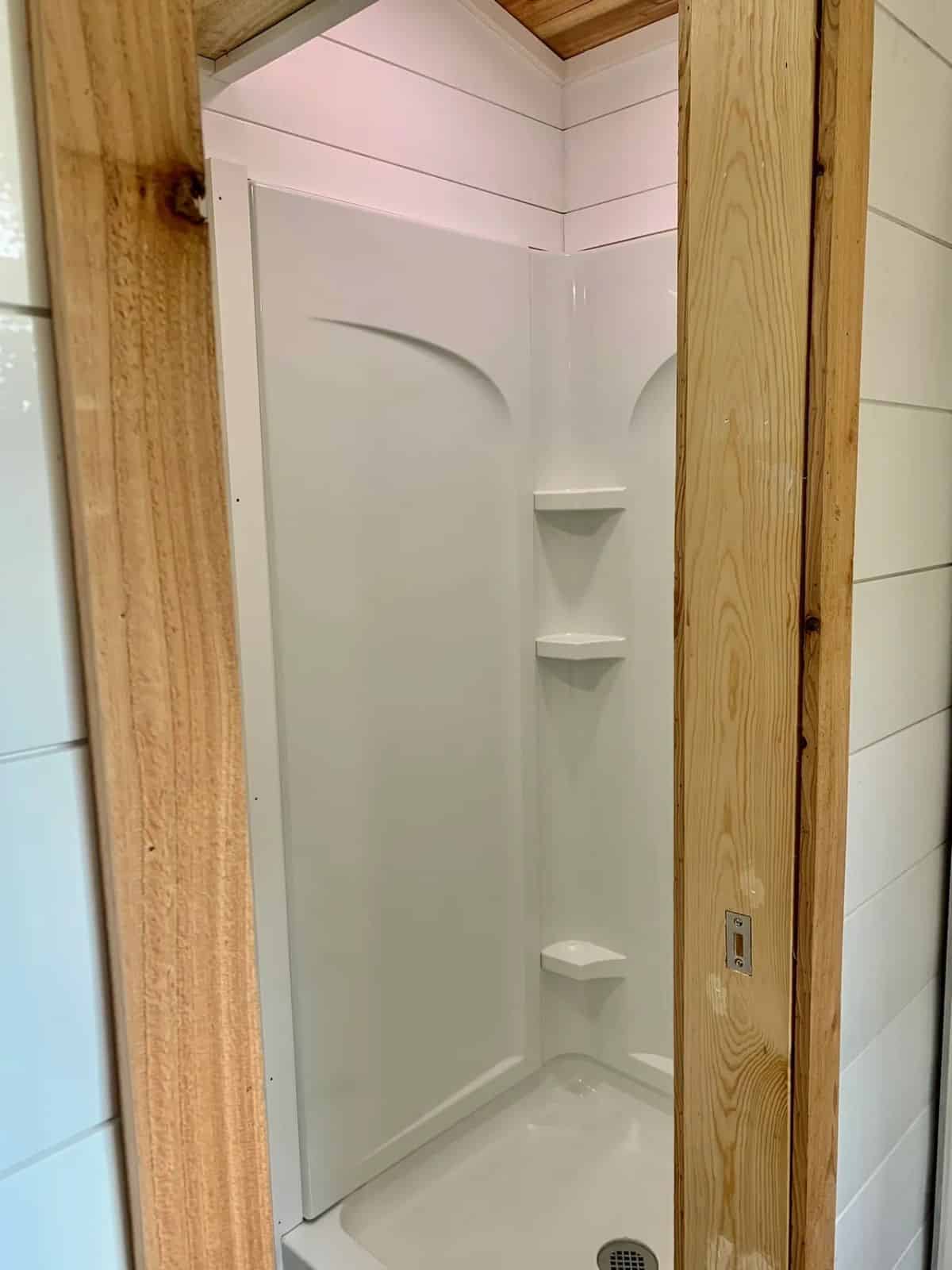 full lengthy shower area in bathroom