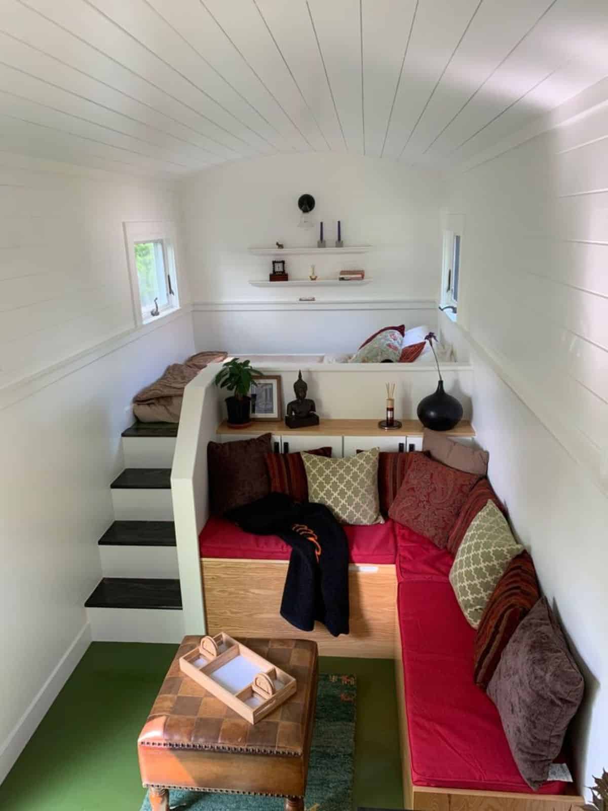 full length stunning interiors of Brand new tiny home from kitchen view