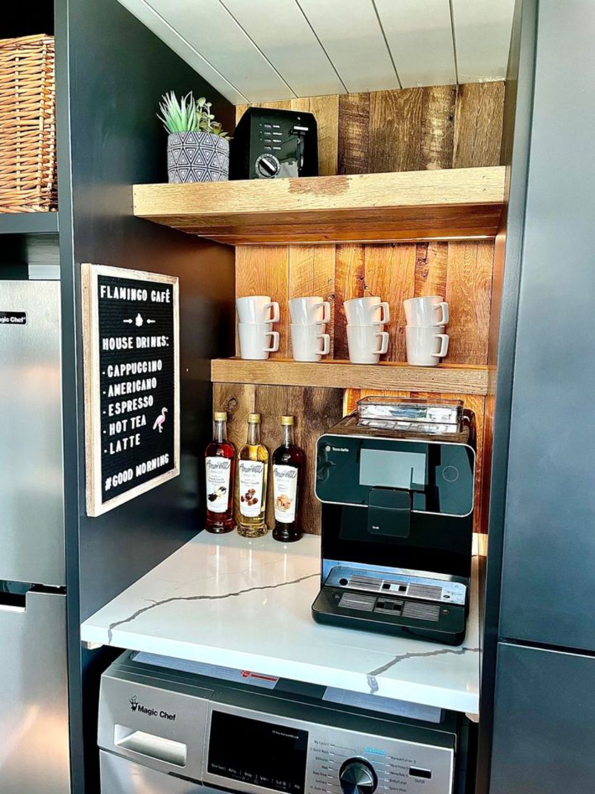 separate coffee space with cups and coffee machine present in the kitchen is included in the deal