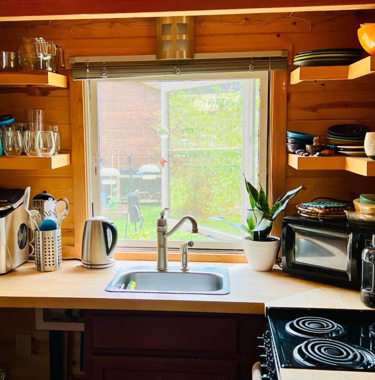kitchen of tiny house in Acony Bell is gorgeous and well organized