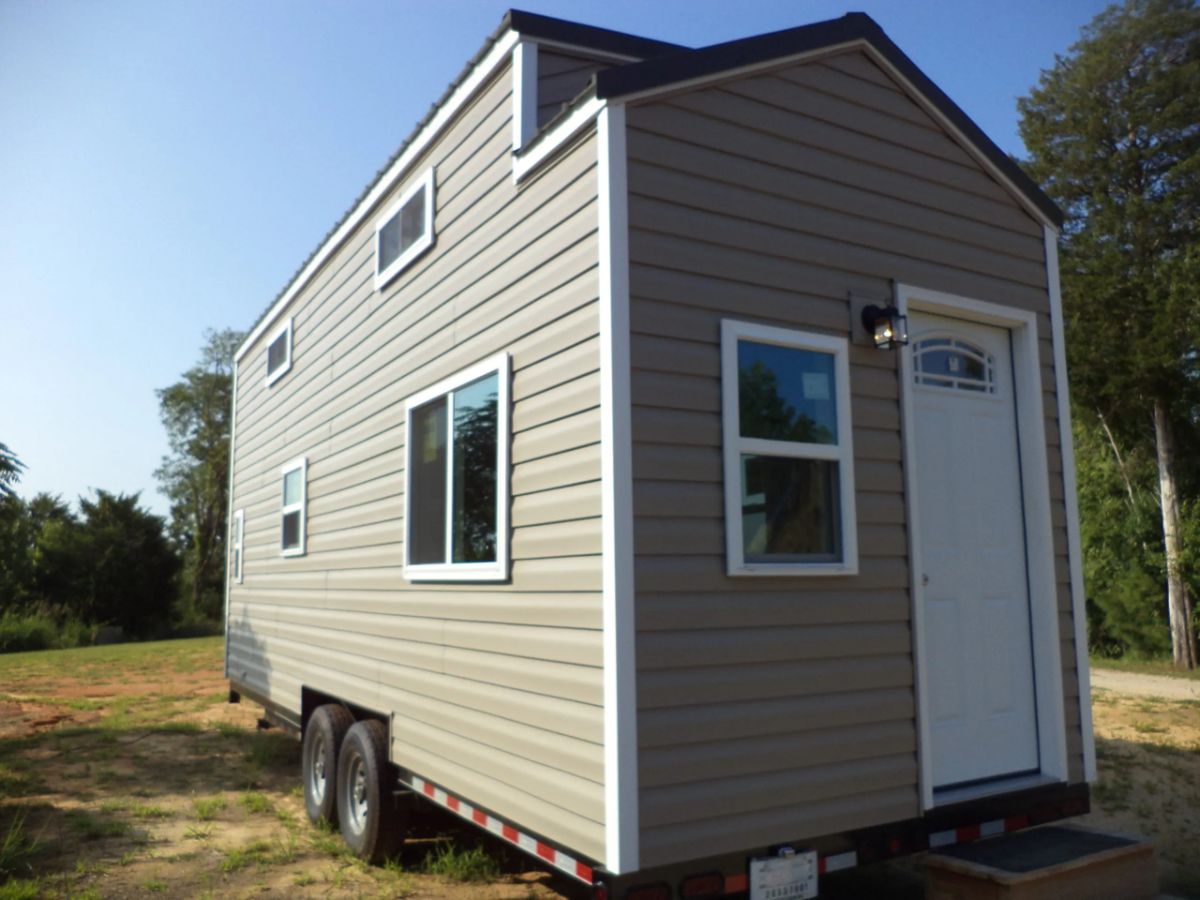 side view of dual lofted tiny home