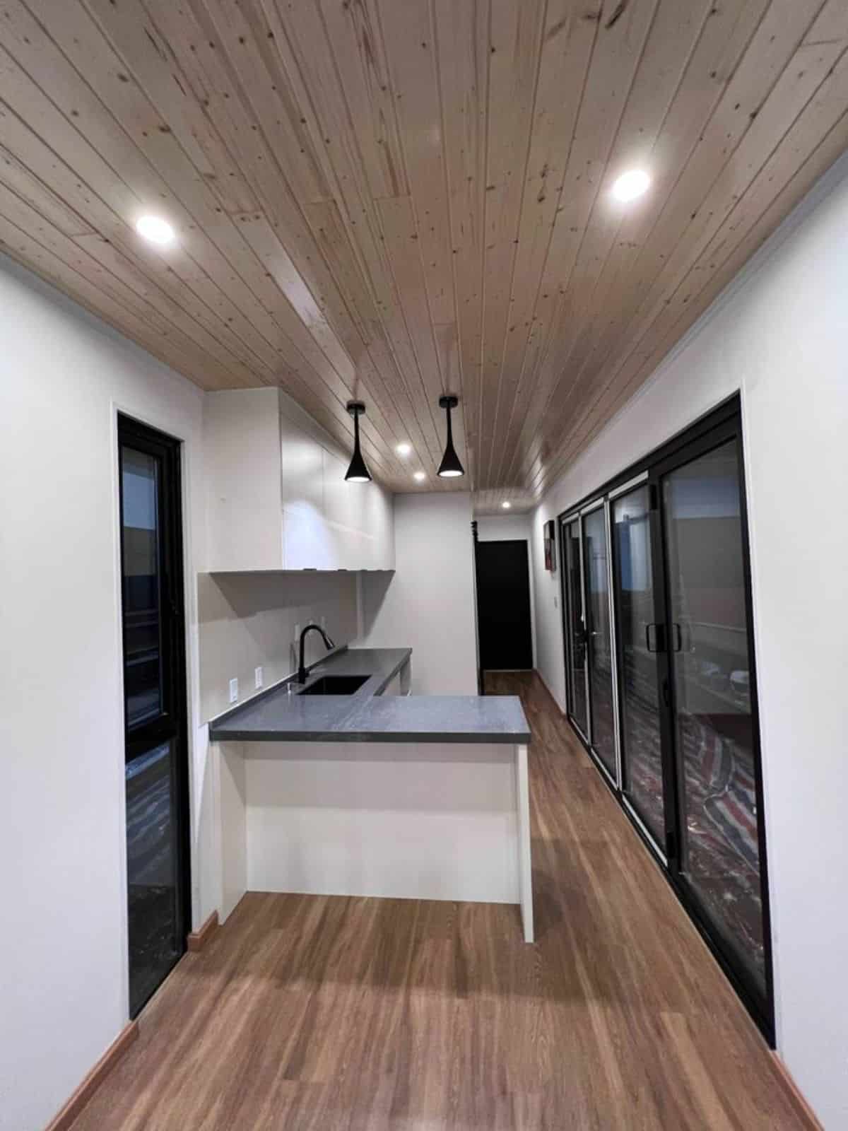 full length wooden interiors of prefab container home