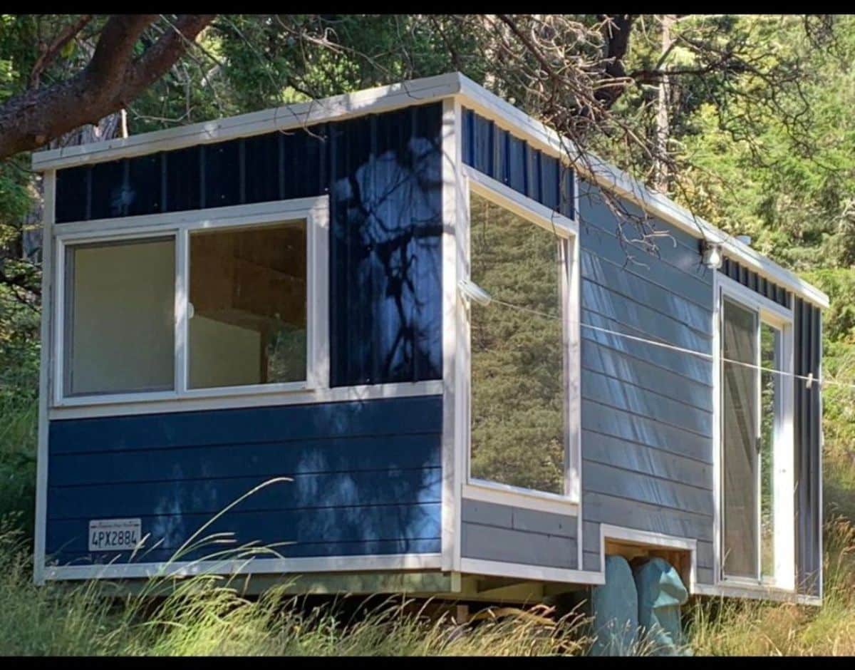 dark blue exteriors of 22' Modern Tiny House