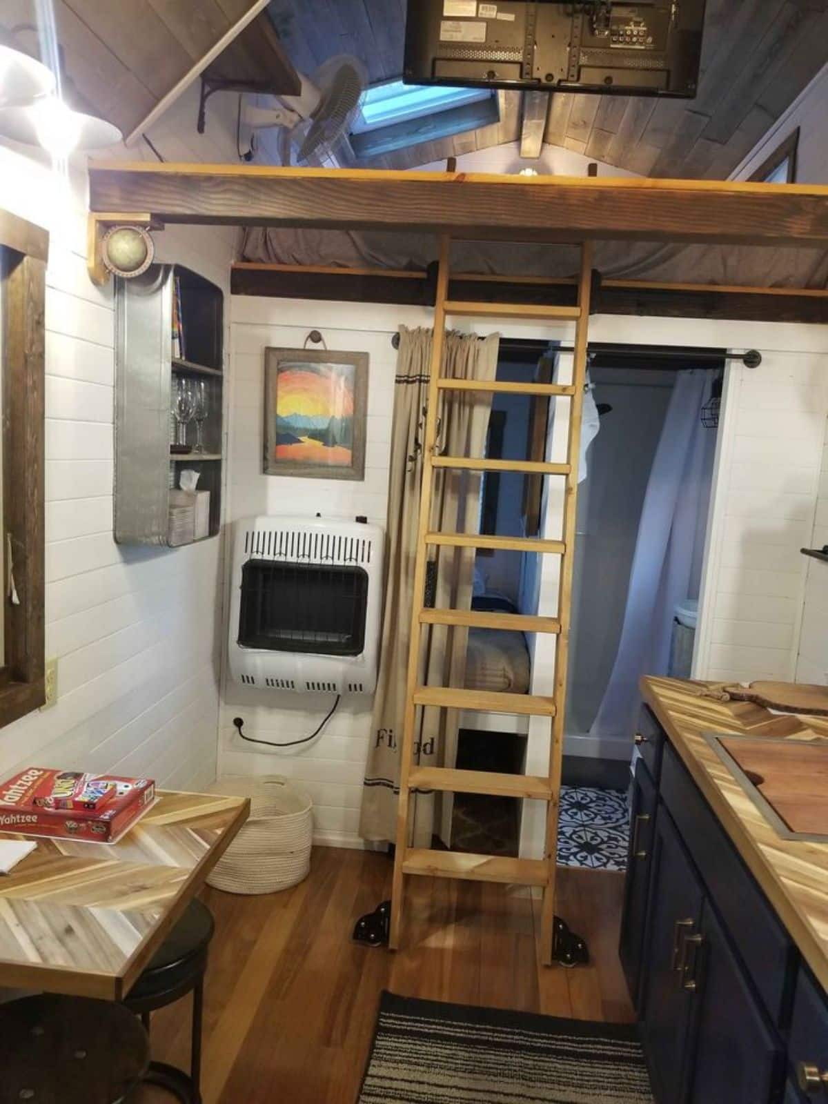full length wooden interiors of Tumbleweed tiny house